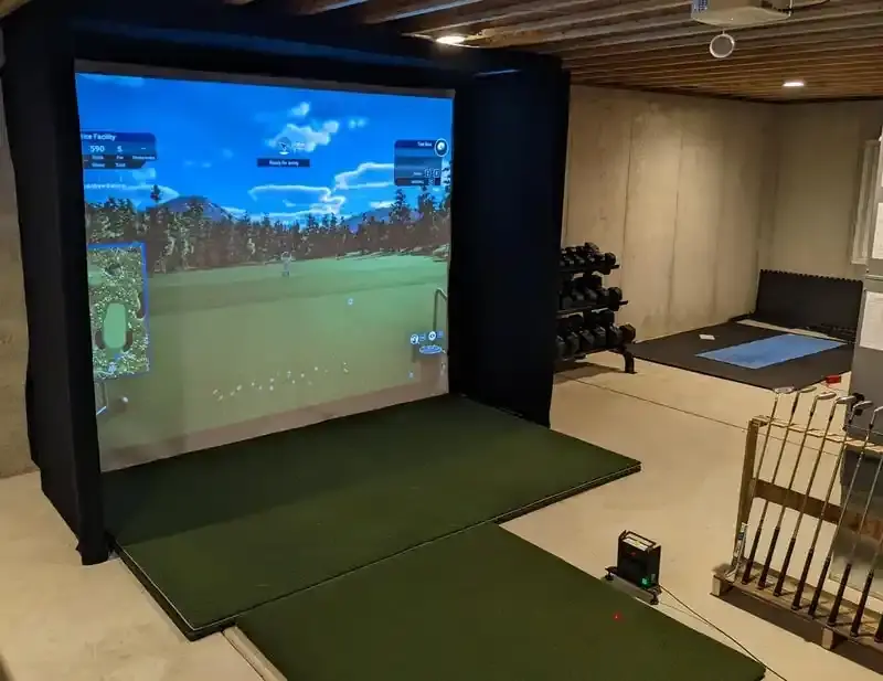 golf simulator man cave in a basement