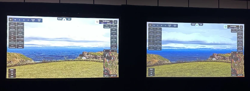 BenQ AK900 golf simulator projector (left) next to the Panasonic VMQ65BU (right) showing the same fairway on the same screen